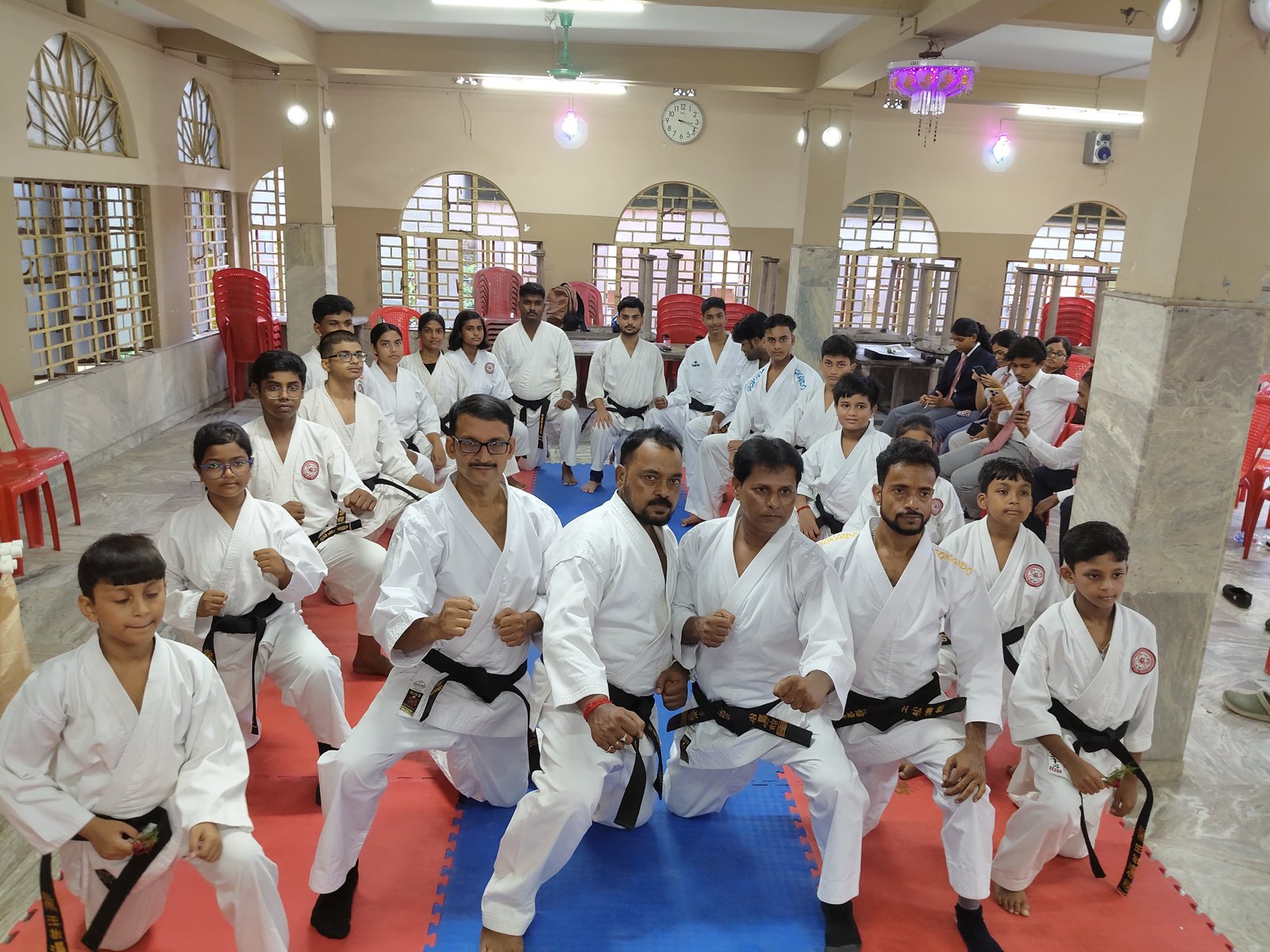 Black 1st and 2nd Dan black belt award ceremony group photo